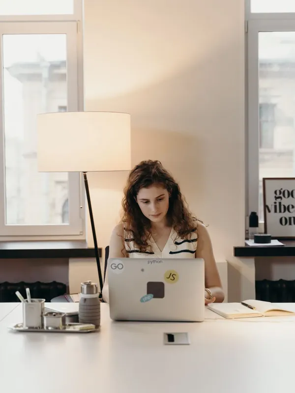 Software specialist working at a laptop